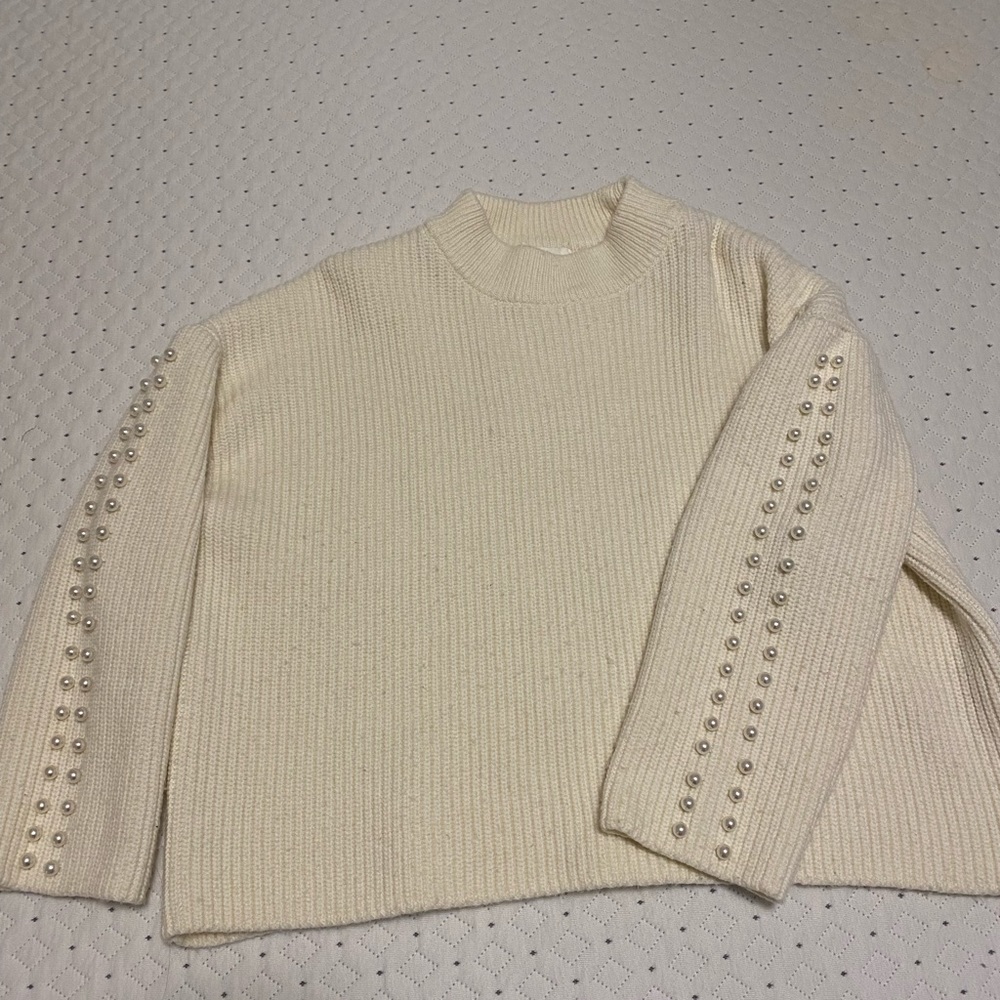 Knit sweater with pearl detail